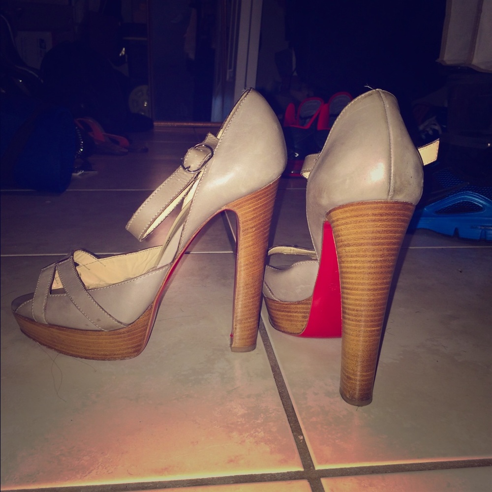 Louboutin pumps with wooden heel